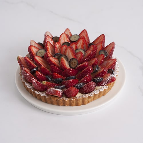 Mrs Jones The Baker has a delicious range of whole cakes including this mouth watering strawberry tart